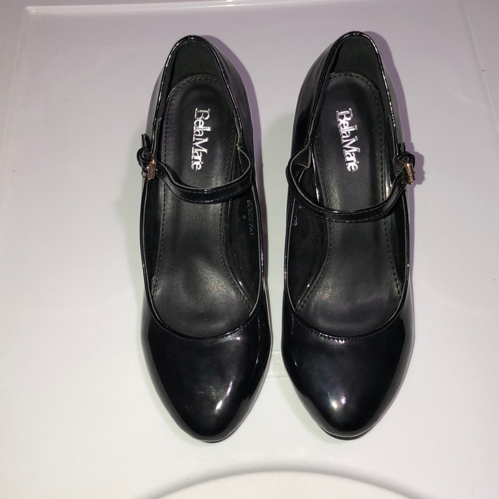 Barley worn black heels